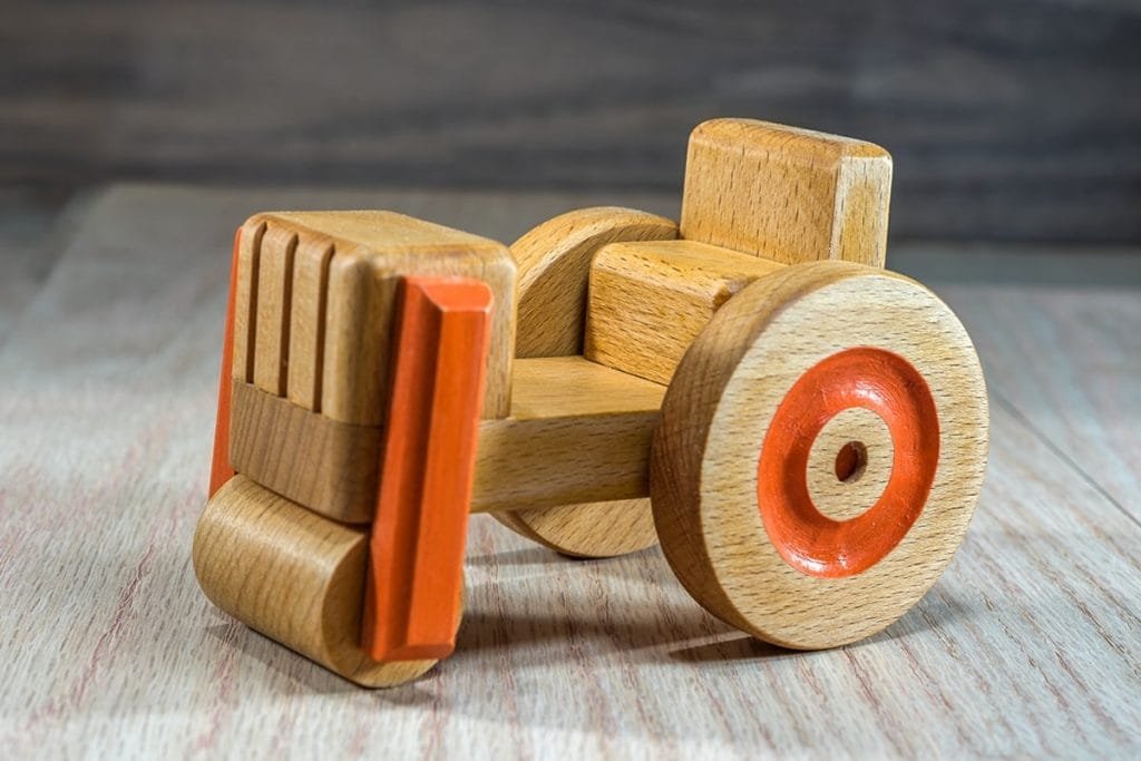 Wooden soil compactor